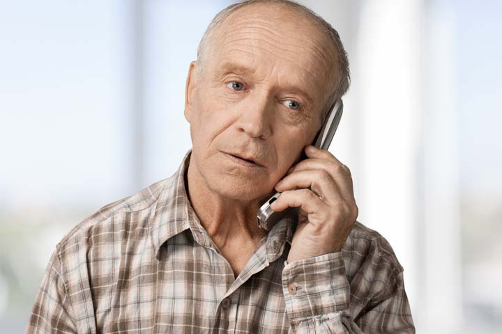 image of man on phone
